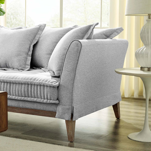Wabush Sofa by Evans & Londeen. Made from 2int foam density 62lbs, m3, 3int foam density 67lbs, 1int foam density 40lbs, silk cotton, non-woven fabric cover, 7pcs of pillows with size 23.5*23.5in.filling with fiber, rubber wood