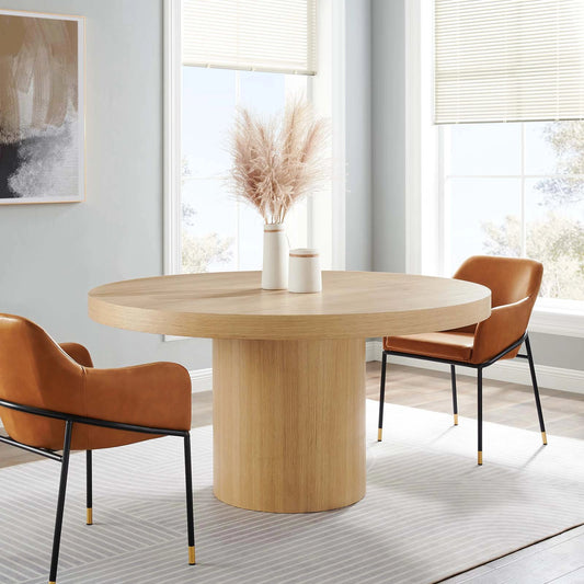 Wadena 60" Round Dining Table by Evans & Londeen. Made from dia 60" round dining table top, p2 mdf panel, base bottom with 4pcs felt mat in a modern style.