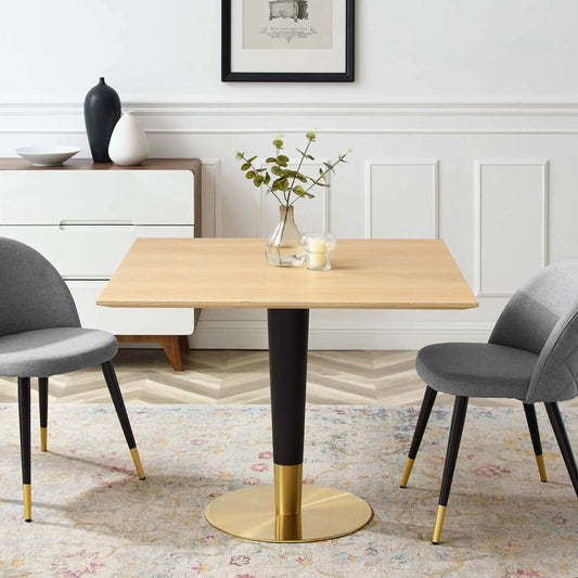 Portage 40" Square Dining Table by Evans & Londeen in gold natural. Made from stainless steel base, mdf painted beveled edge in a modern style.