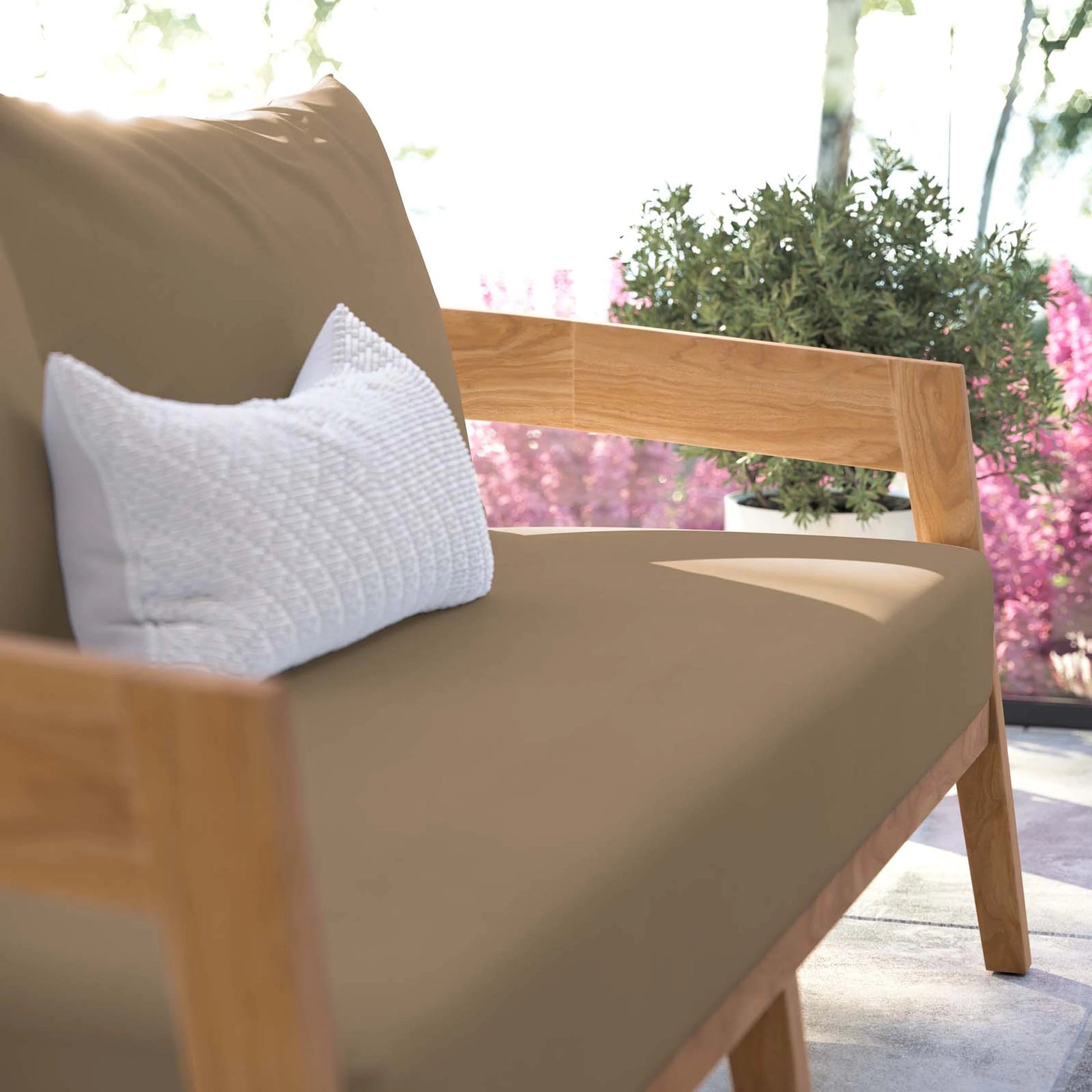 Hazelton Teak Wood Loveseat by Evans & Londeen. Made from teak wood, polyester, mesh sling, plastic tack glides, stainless steel in a modern style.