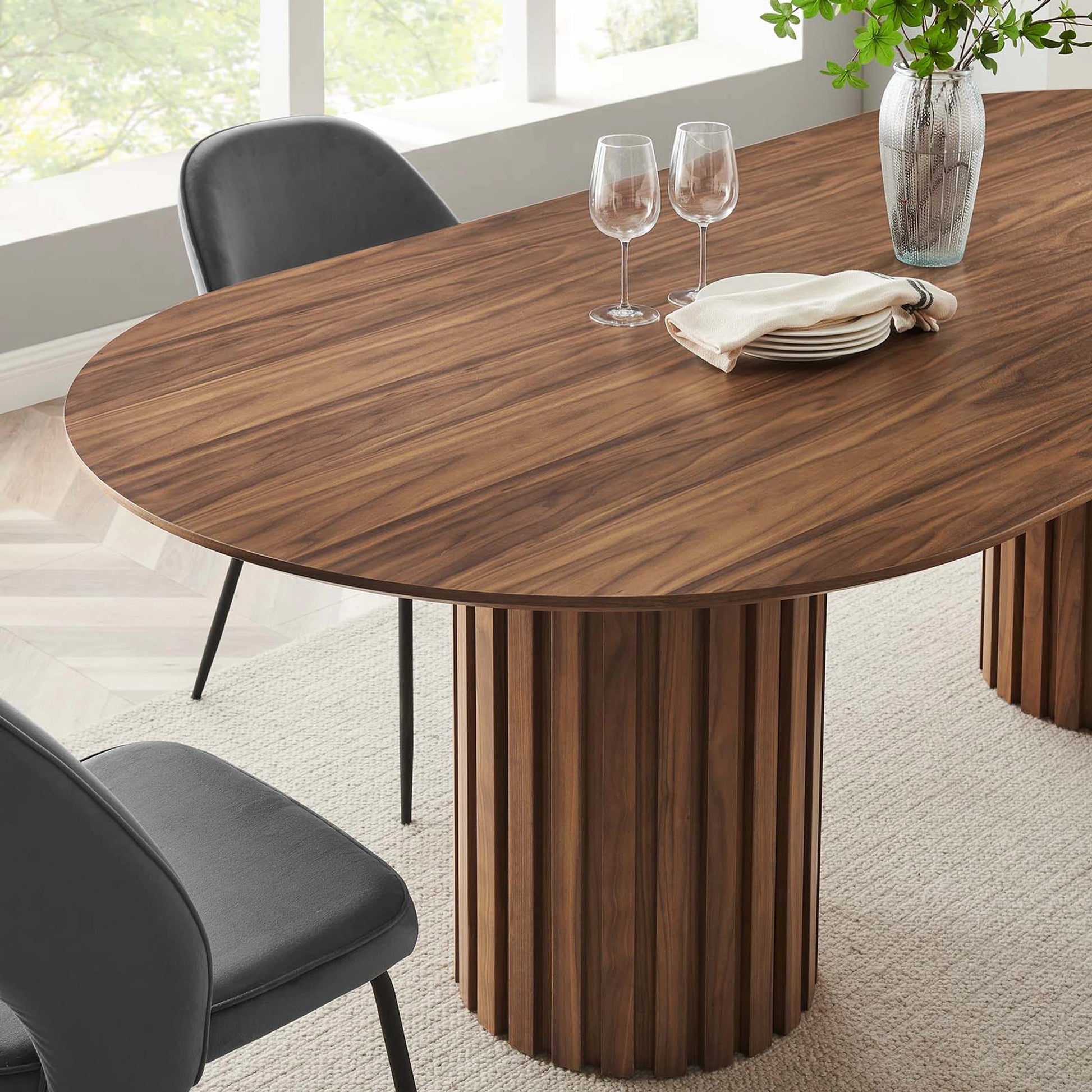 Fairbanks 95" Oval Dining Table by Evans & Londeen. Made from p2 mdf panel, american walut veneer color code: wa-01, bottom of both base is with 1 whole piece of 3mmt felt pad in a modern style.