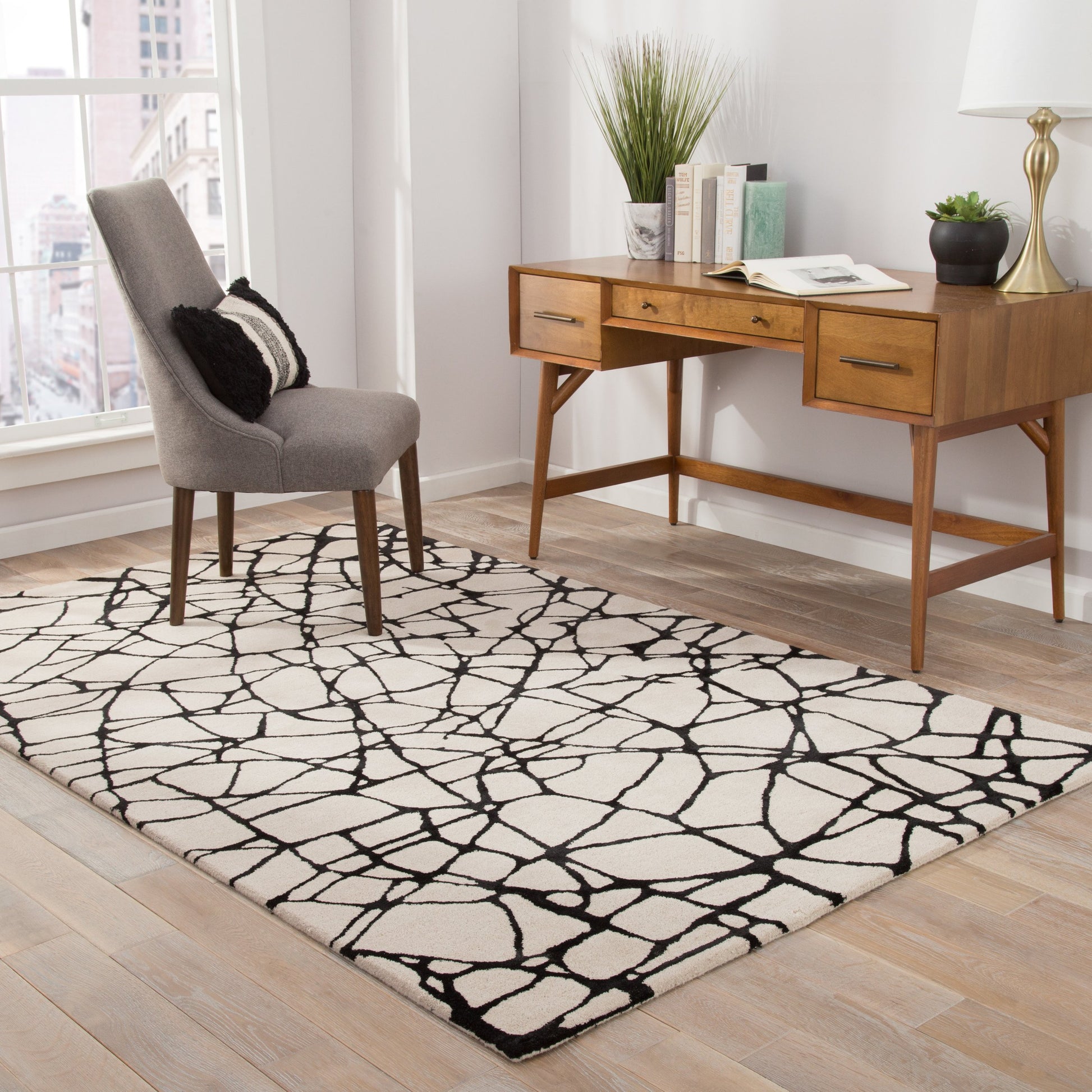 Etho By Nikki Chu ENK12 Rug by Jaipur Living in ivory, black. Made from 70% wool, 30% viscose in a unique style.