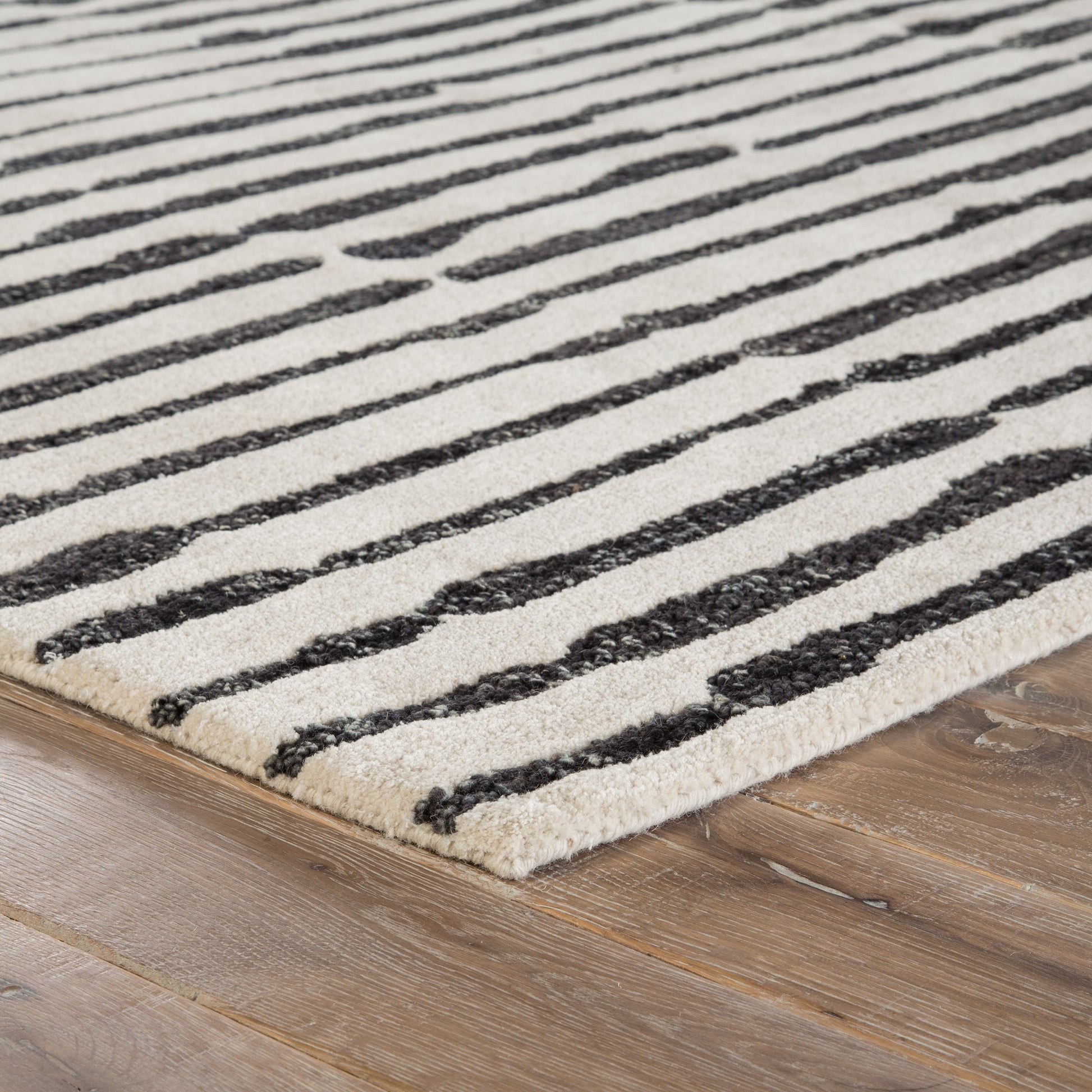 Vera by Nikki Chu ENK13 Rug by Jaipur Living in white, black. Made from unique in a unique style.