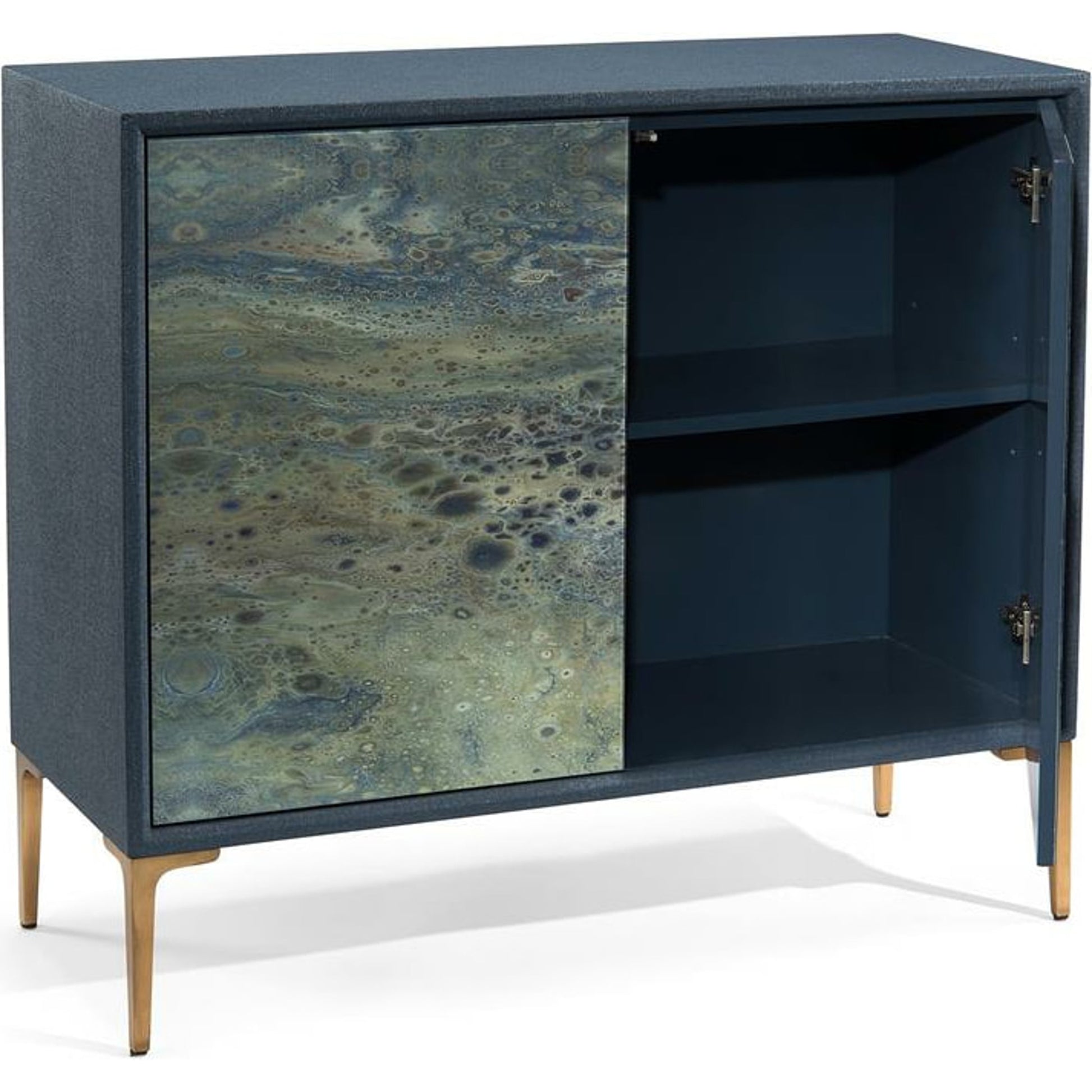 Shaye Rawson's Pavo Cabinet by John-Richard in indigo. Made from glass, metal in a coastal style.