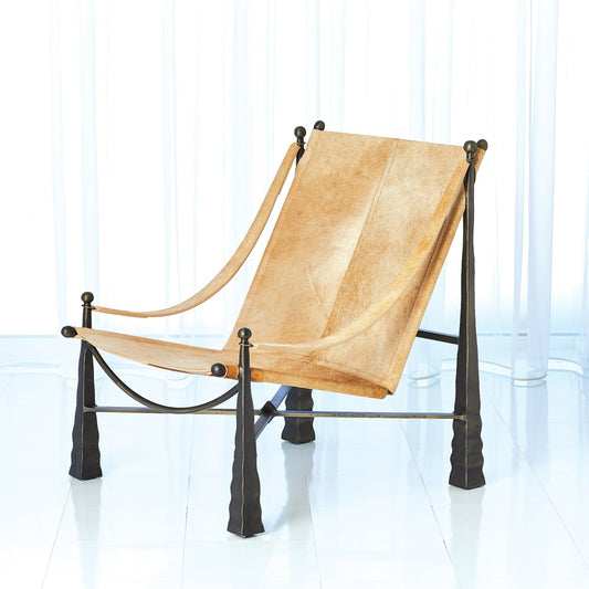Cognac Chair by Global Views. Made from metal, cowhide in a rustic style.