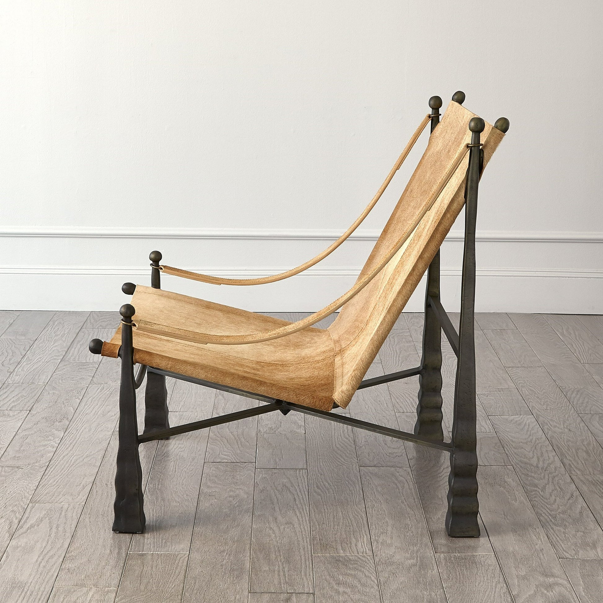 Cognac Chair by Global Views. Made from metal, cowhide in a rustic style.