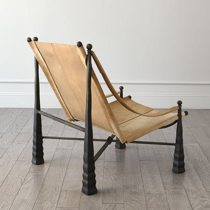 Cognac Chair by Global Views. Made from metal, cowhide in a rustic style.