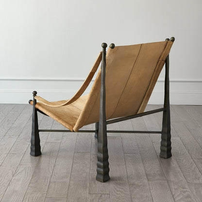 Cognac Chair by Global Views. Made from metal, cowhide in a rustic style.