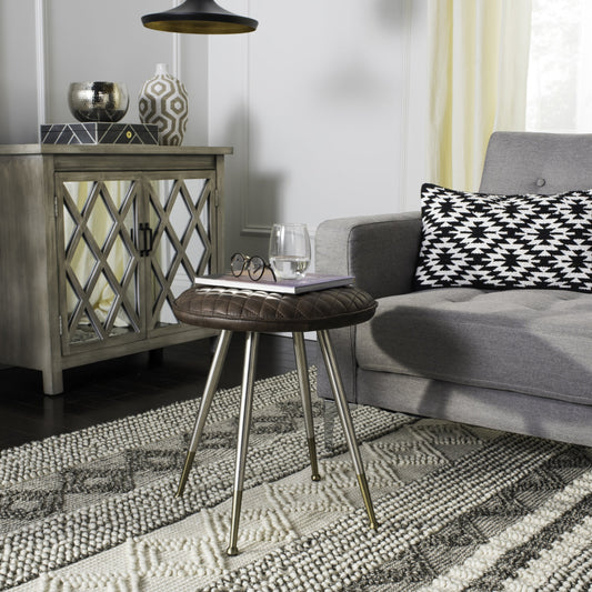 Brinley Stool by Safavieh. Made from 60% faux leather, 28% polyester, 12% cotton, steel, foam in a eclectic & global style.