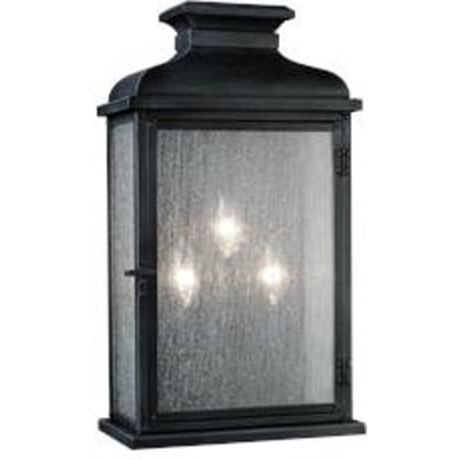 Pediment Outdoor Sconce by Generation Lighting in dark weathered zinc. Made from stainless steel in a traditional style.