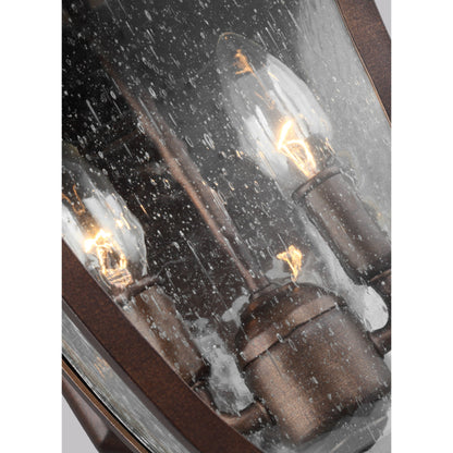 Oakmont Outdoor Wall Lantern by Generation Lighting in patina bronze. Made from cast aluminum in a traditional style.
