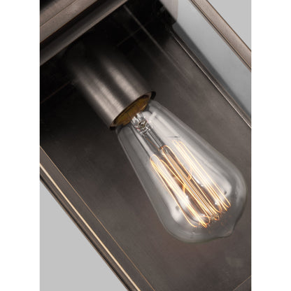 Glenview Outdoor Wall Lantern by Generation Lighting in antique bronze. Made from cast aluminum in a transitional style.