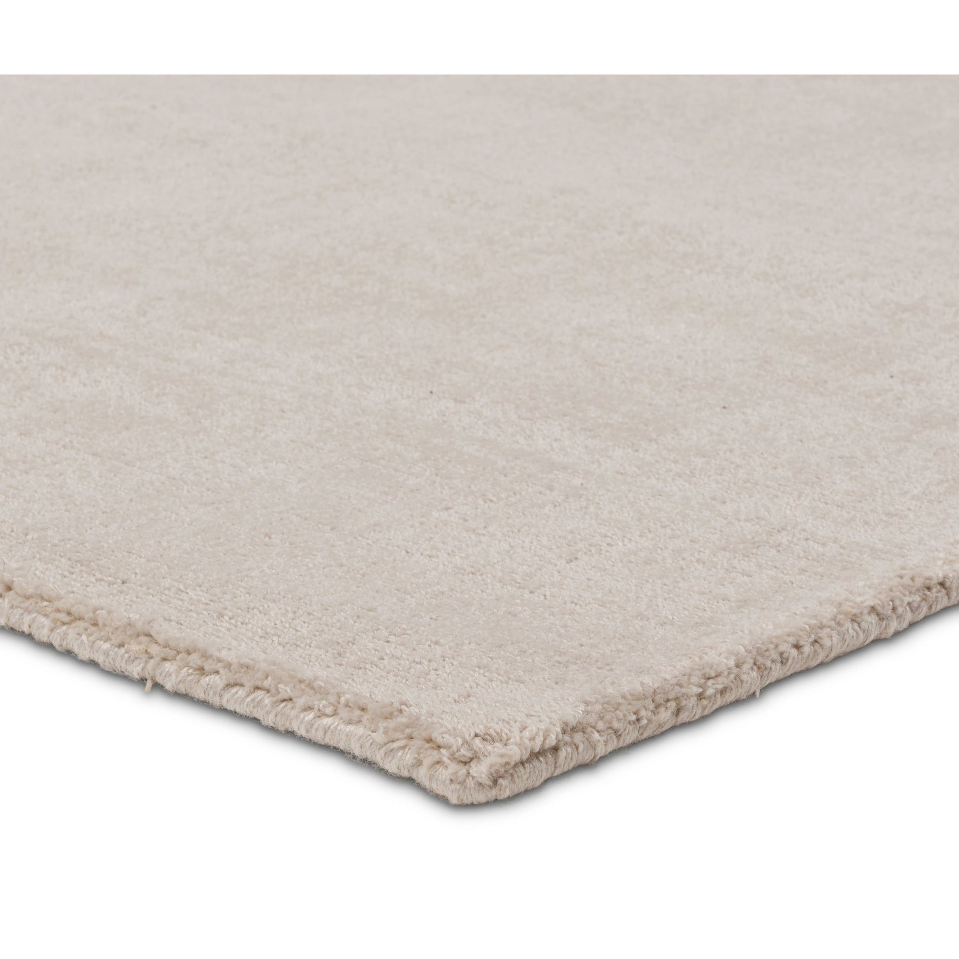 Fletcher FTR01 Rug by Jaipur Living in cream. Made from 100% pet yarn in a unique style.