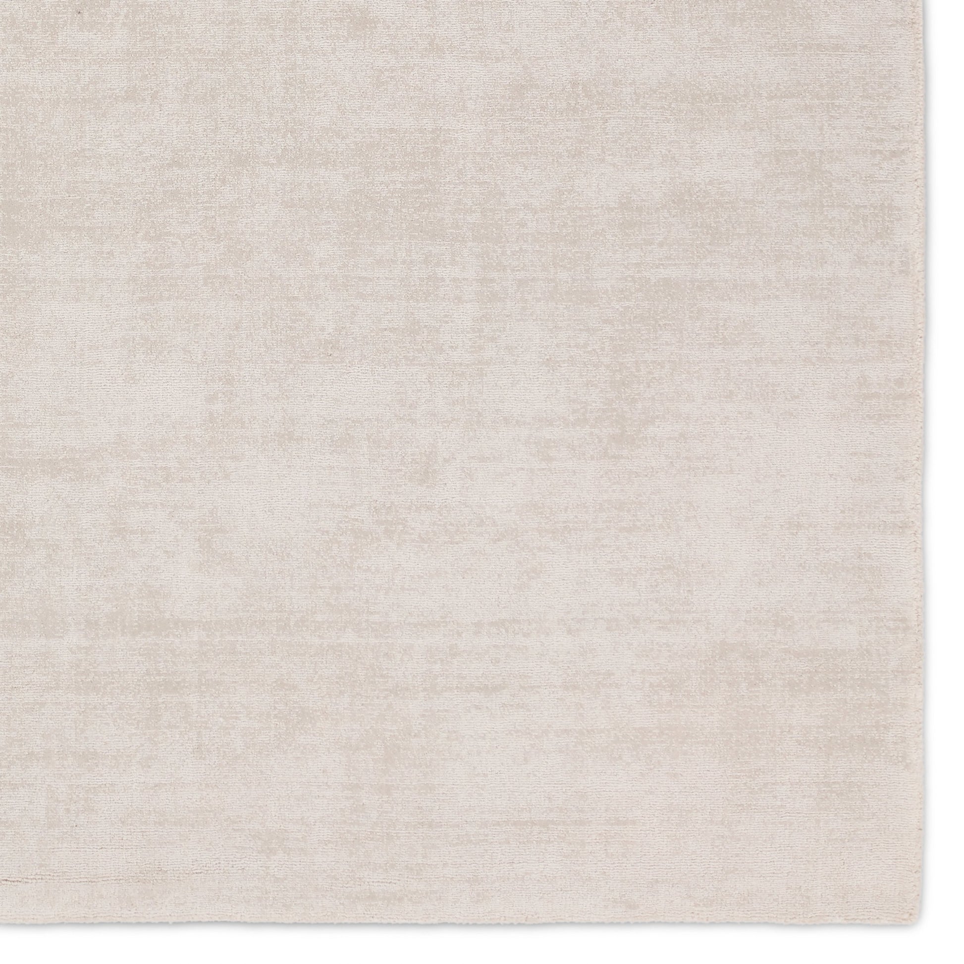 Fletcher FTR01 Rug by Jaipur Living in cream. Made from 100% pet yarn in a unique style.