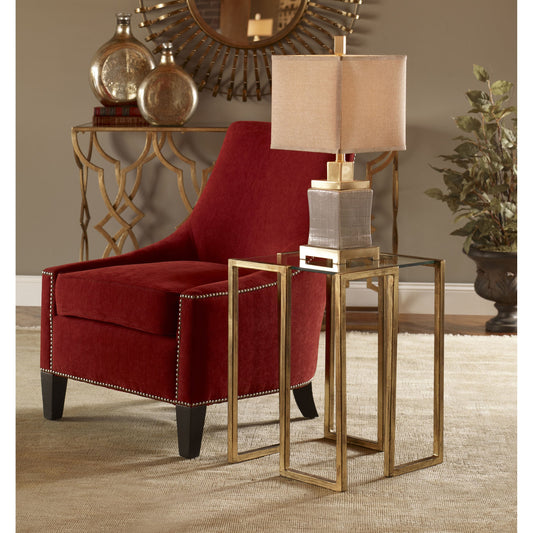 Mirrin Accent Table by Uttermost. Made from iron, glass in a modern style.