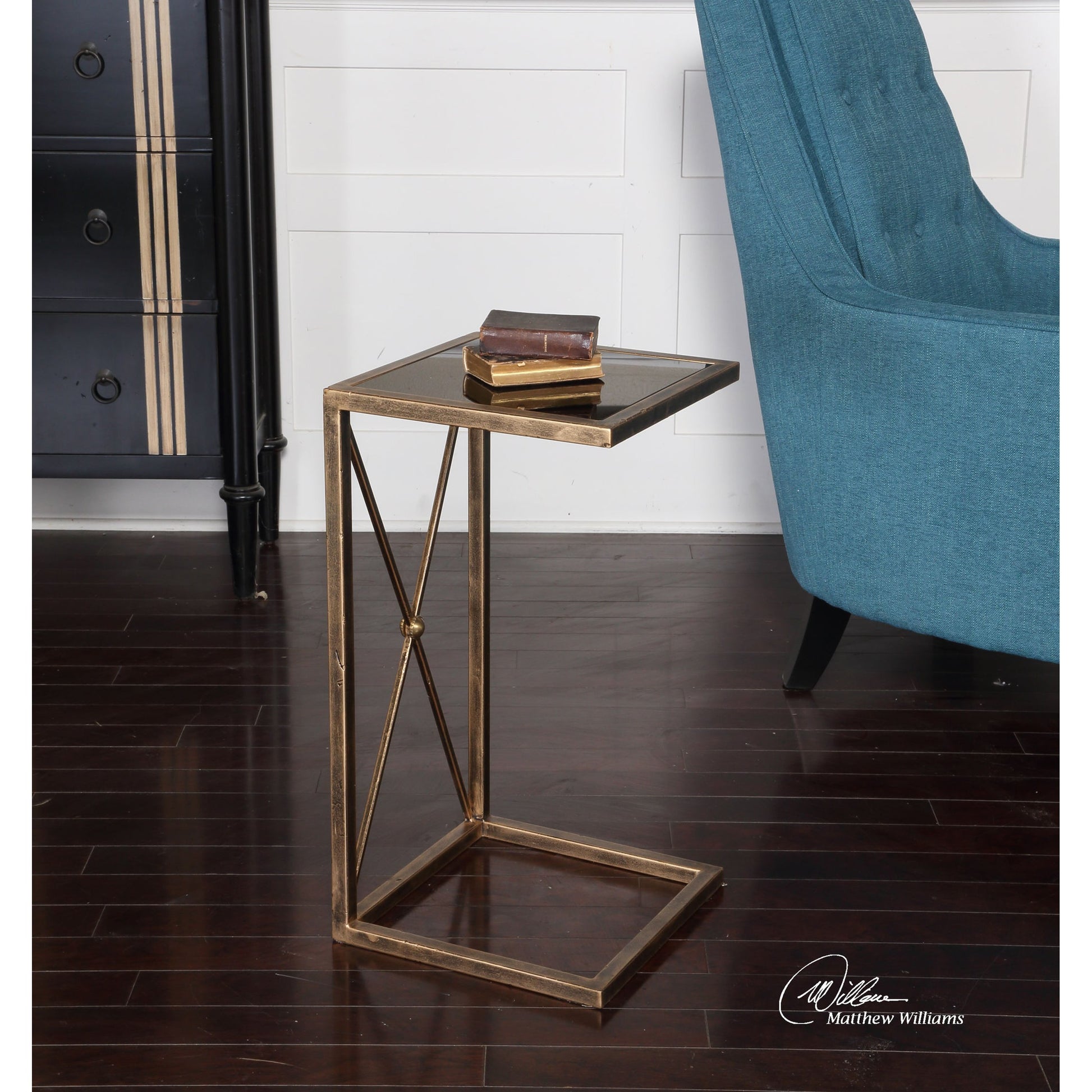 Zafina Side Table by Uttermost in gold. Made from iron, glass in a modern style.