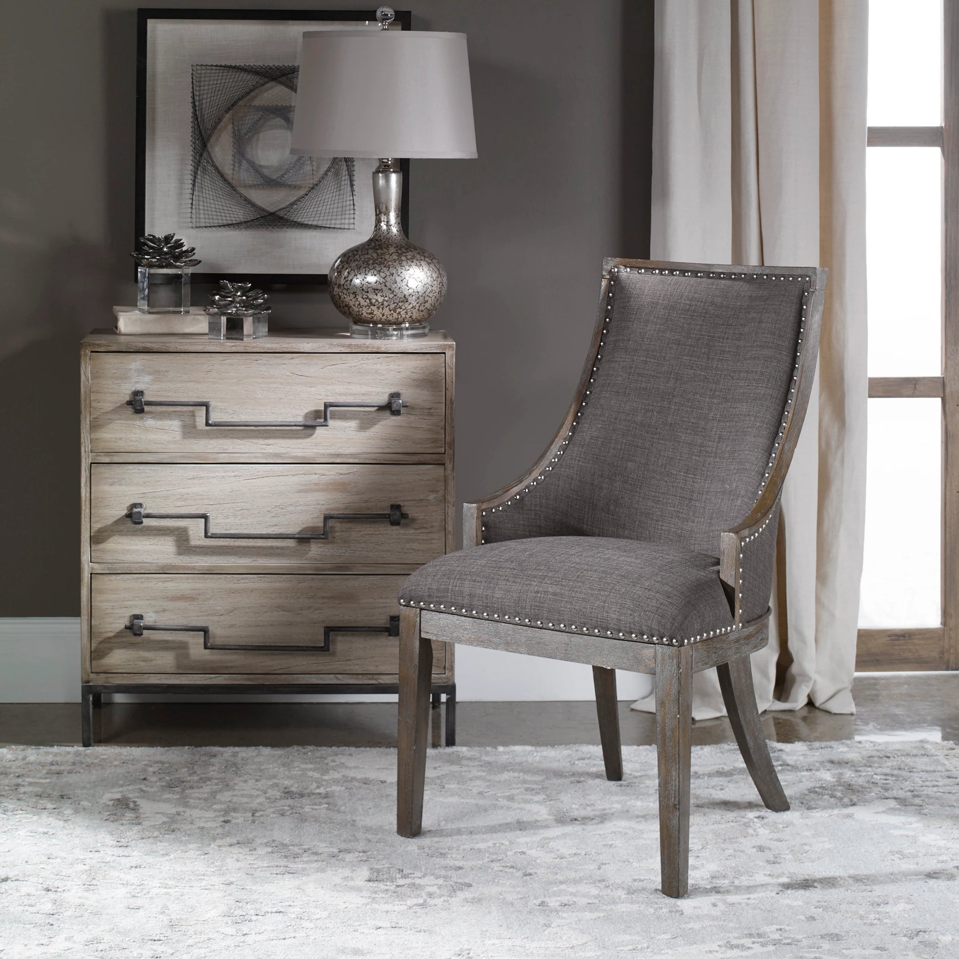 Aidrian Accent Chair by Uttermost in gray. Made from bent wood, solid wood, plywood, fabric, foam in a cottage & farmhouse style.