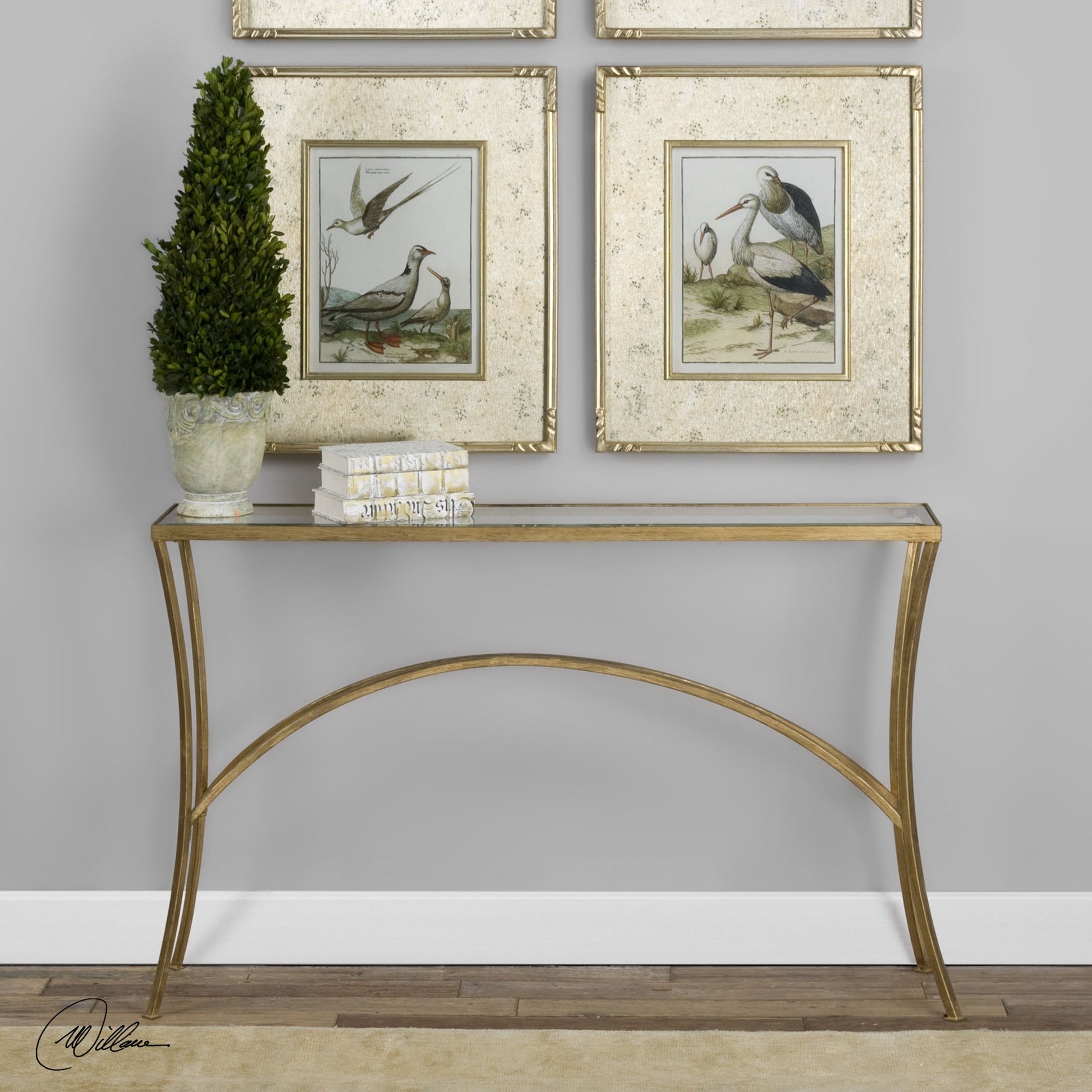 Alayna Console Table by Uttermost in black. Made from metal, tempered glass in a modern style.