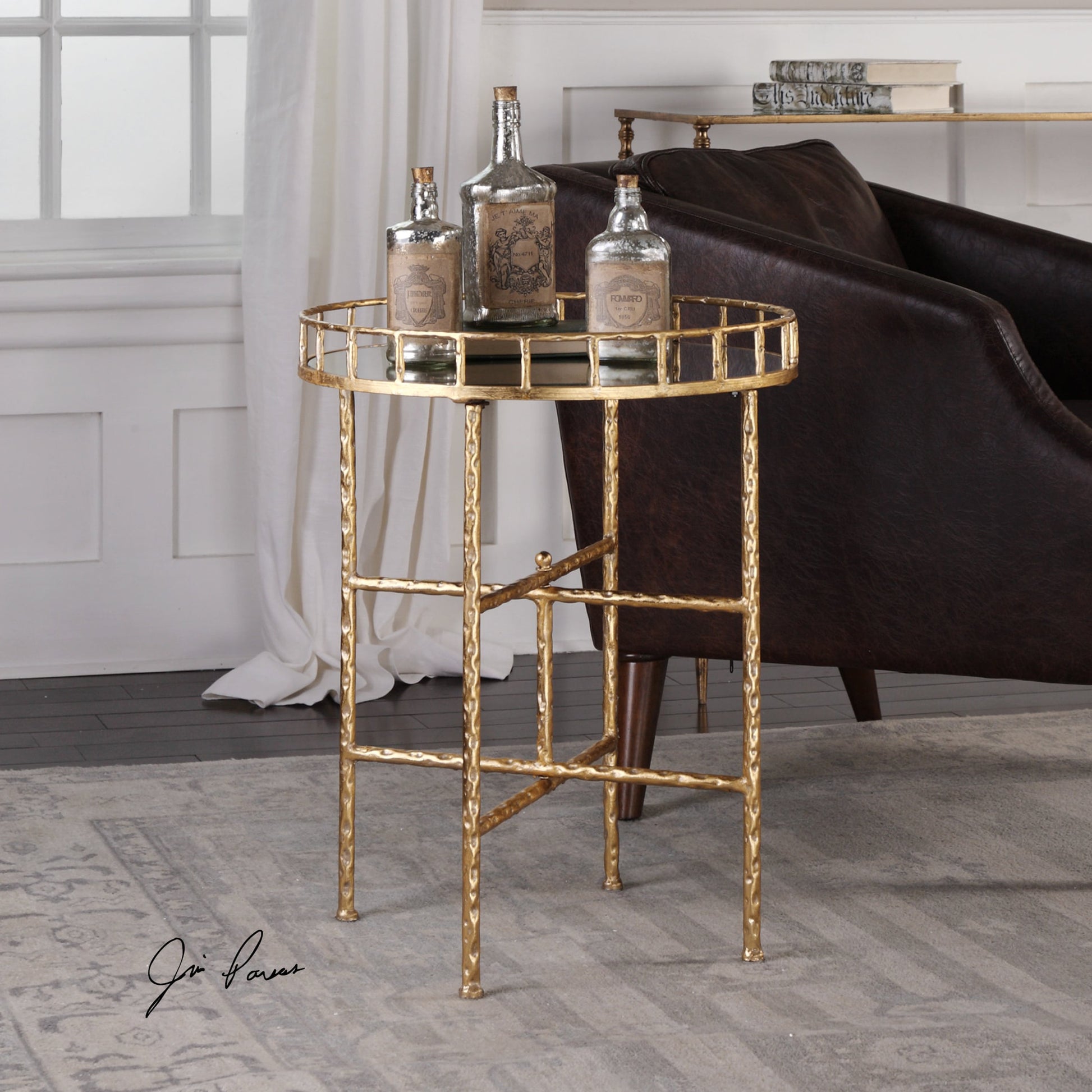 Tilly Accent Table by Uttermost in gold. Made from iron, mdf, mirror in a modern style.
