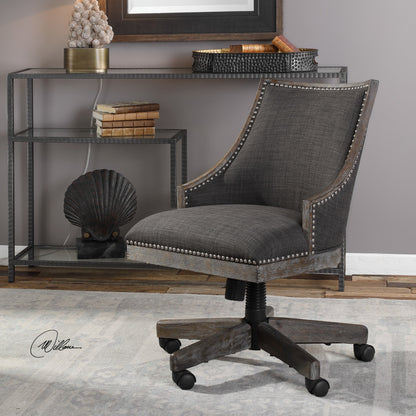 Aidrian Charcoal Desk Chair by Uttermost in charcoal. Made from metal, bent wood, plywood, fabric, foam in a cottage & farmhouse style.