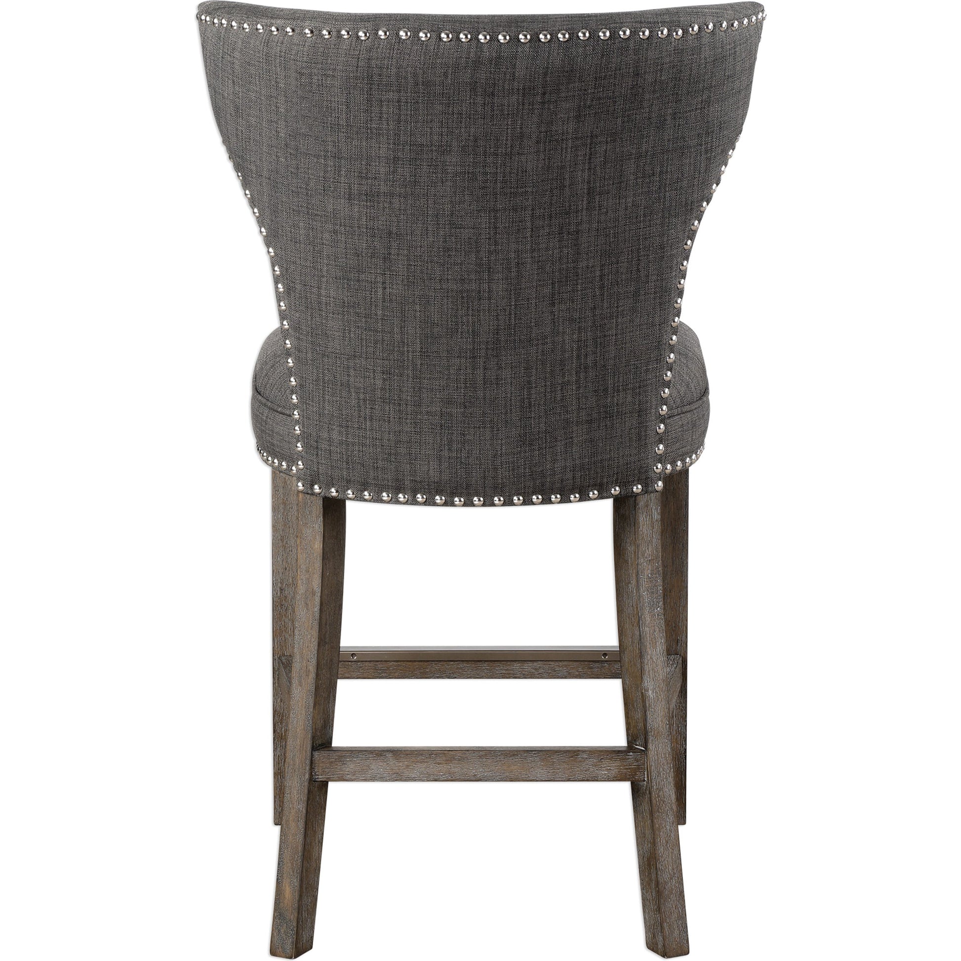 Arnaud Charcoal Counter Stool by Uttermost in charcoal. Made from solid wood, plywood, fabric, foam in a cottage & farmhouse style.