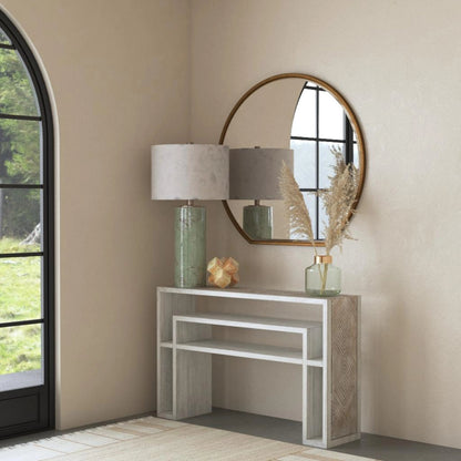 Genara Bone White Carved Console Table by Uttermost in white. Made from mahogany wood in a modern style.