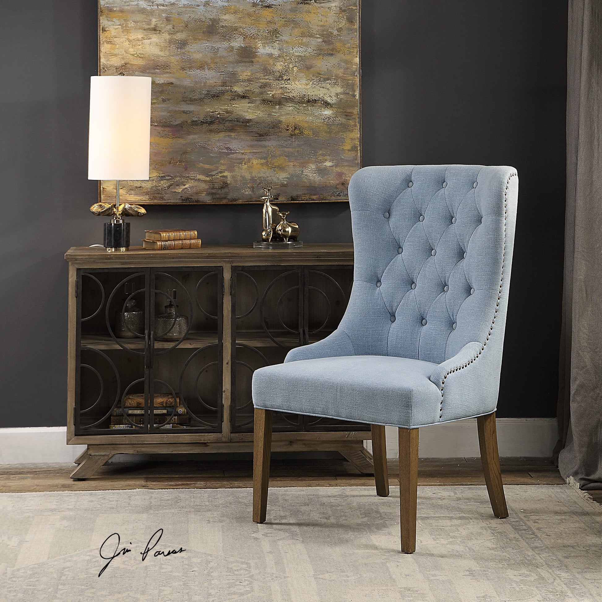 Rioni Tufted Wing Chair by Uttermost. Made from fabric, oak wood, plywood, foam in a traditional style.