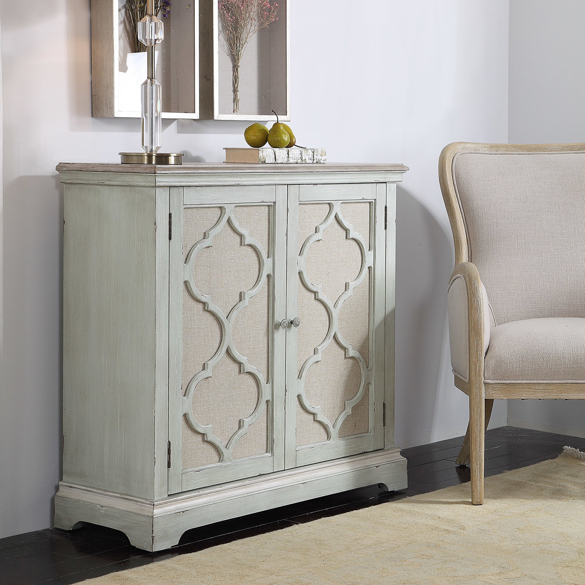 Sophie Cabinet by Uttermost. Made from alm veneer, mdf, linen in a cottage & farmhouse style.