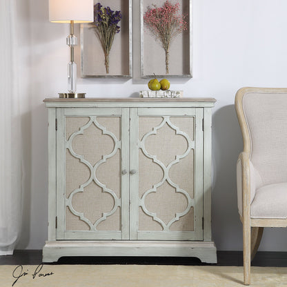Sophie Cabinet by Uttermost. Made from alm veneer, mdf, linen in a cottage & farmhouse style.