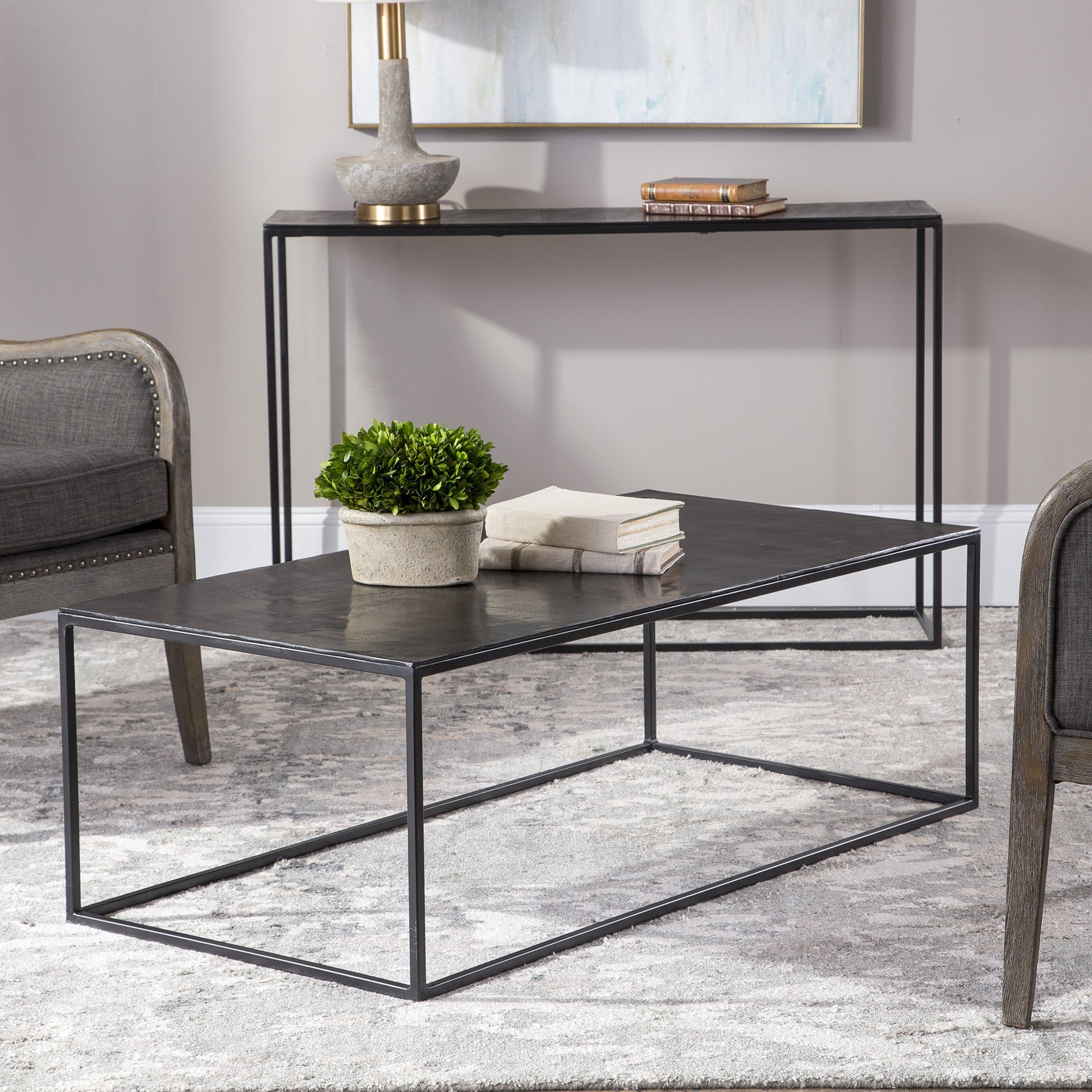 Coreene Coffee Table by Uttermost in aged black, antique bronze. Made from aluminum, iron in a modern style.