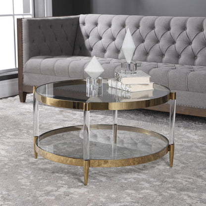 Kellen Coffee Table by Uttermost in gold. Made from stainless steel, glass, acrylic in a transitional style.