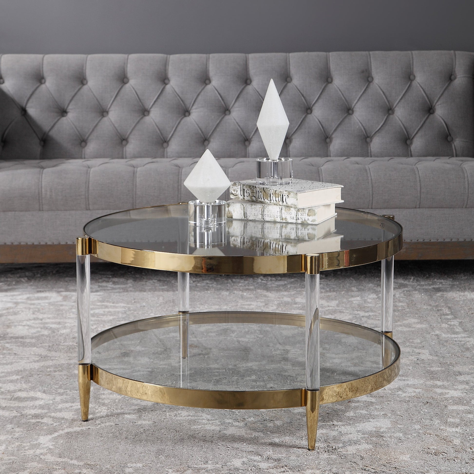 Kellen Coffee Table by Uttermost in gold. Made from stainless steel, glass, acrylic in a transitional style.