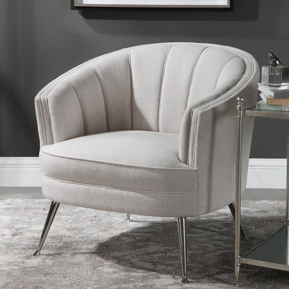 Janie Accent Chair by Uttermost in polished nickel. Made from fabric, plywood, foam, iron in a modern style.