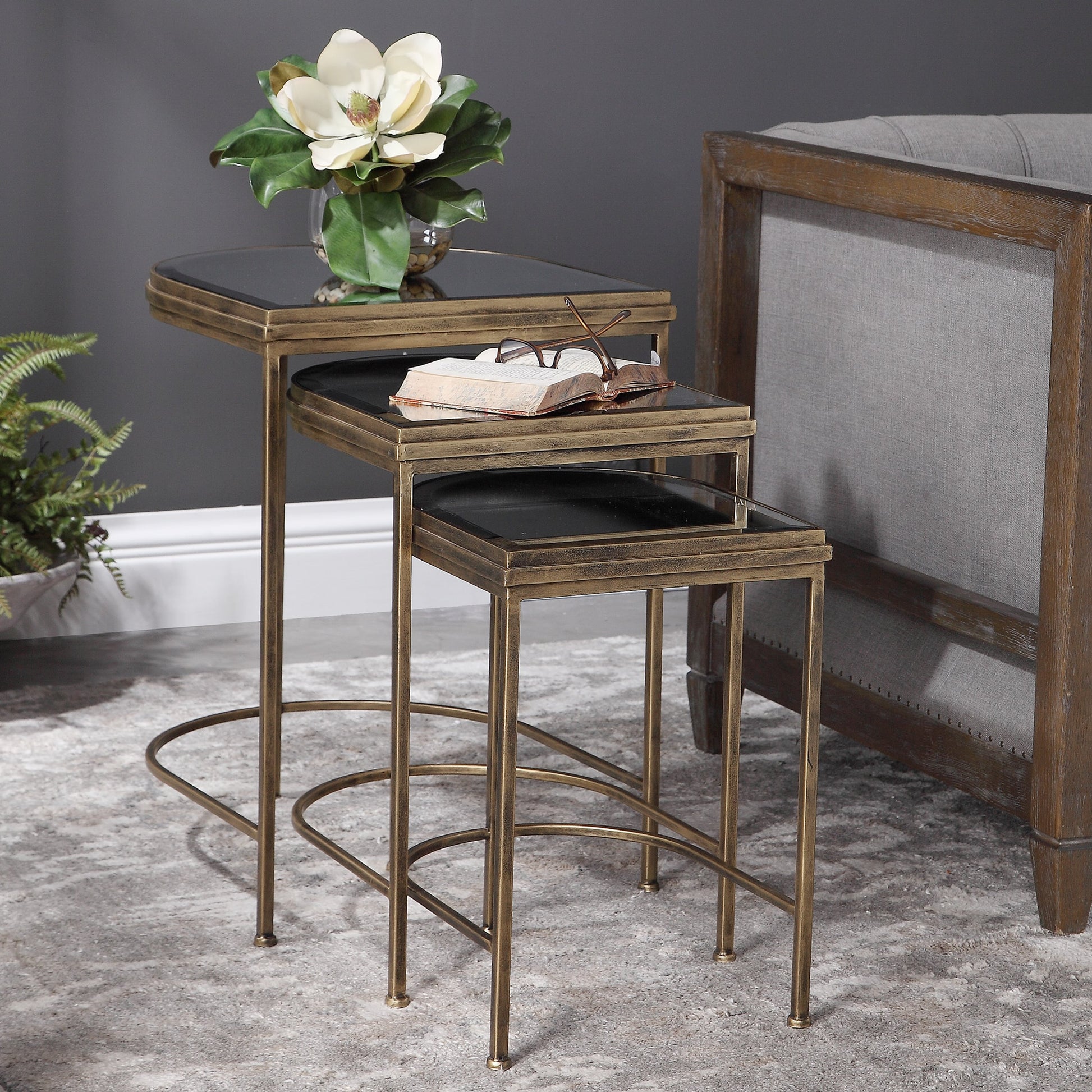 India Nesting Tables by Uttermost in antique brushed gold. Made from mirror 45%, iron 55% in a transitional style.