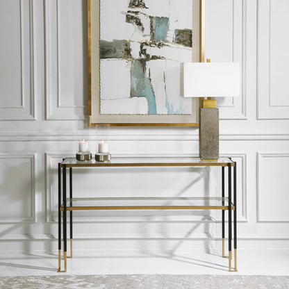 Kentmore Modern Console Table by Uttermost in matte black, brushed gold. Made from iron, glass in a transitional style.