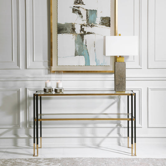 Kentmore Modern Console Table by Uttermost in matte black, brushed gold. Made from iron, glass in a transitional style.