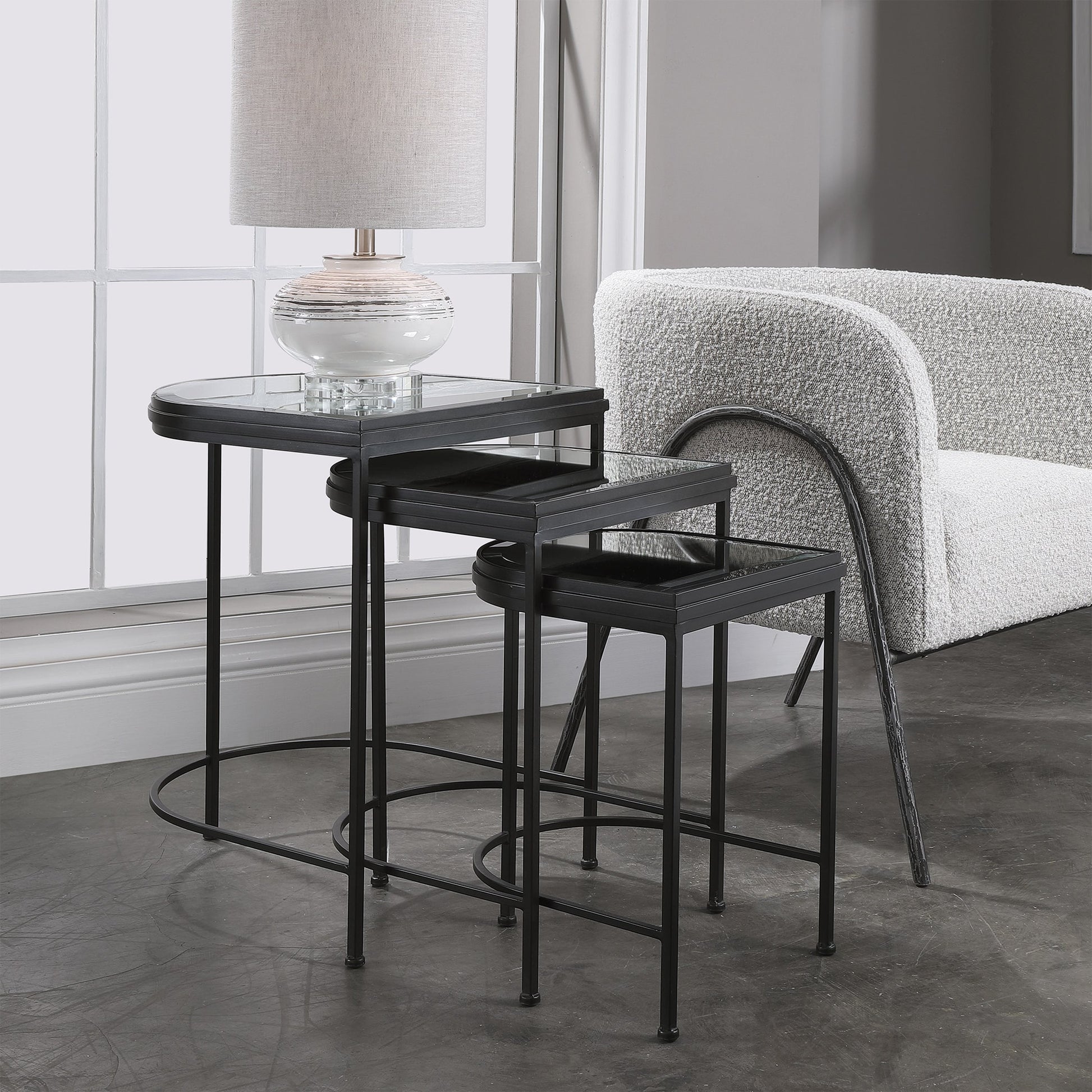 India Nesting Tables by Uttermost in antique brushed gold. Made from mirror 45%, iron 55% in a transitional style.