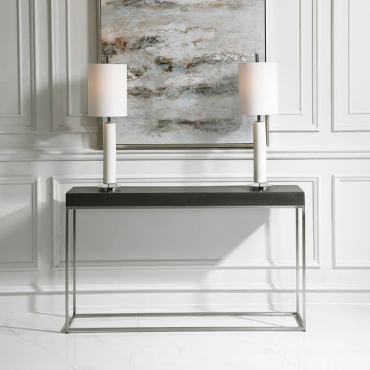 Jase Console Table by Uttermost in black. Made from resin 80%, stainless steel 20% in a modern style.