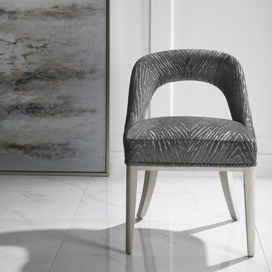 Amalia Accent Chair by Uttermost. Made from rubber wood, bent wood, plywood, fabric, foam in a transitional style.
