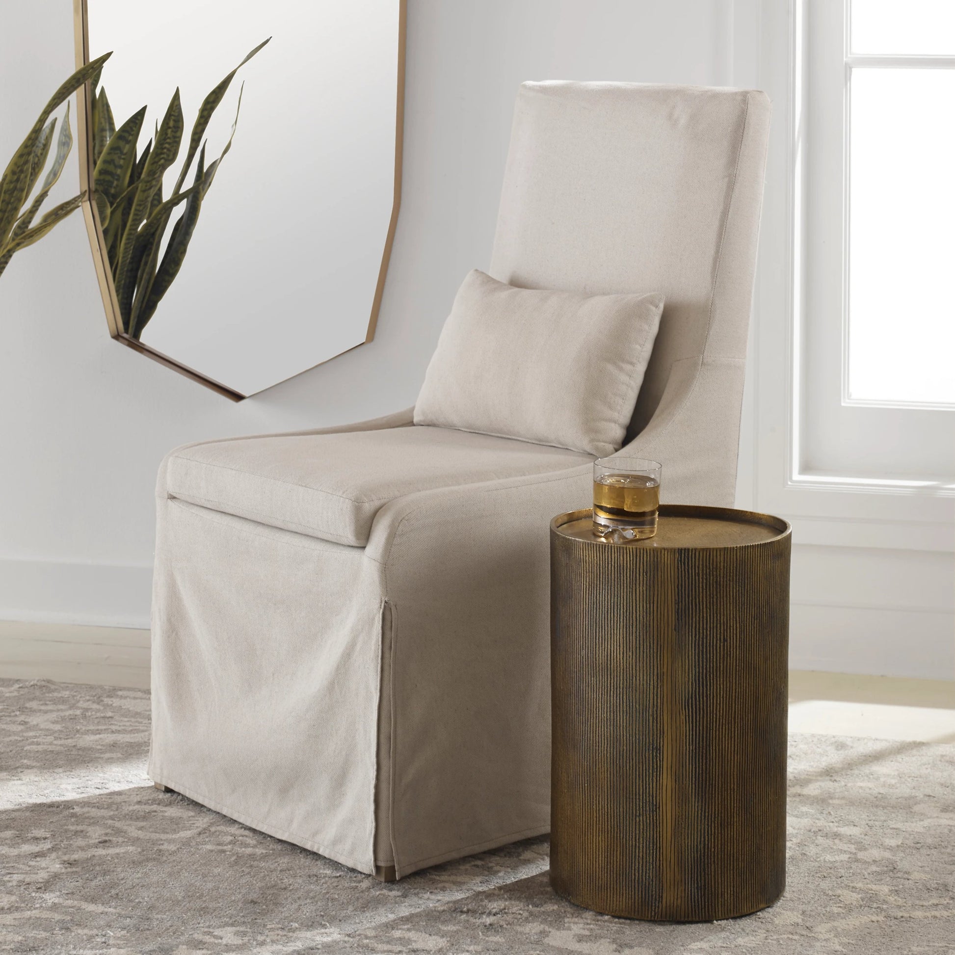 Adrina Accent Table by Uttermost in gold. Made from aluminum in a eclectic & global style.