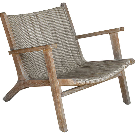 Aegea Rattan Accent Chair by Uttermost. Made from mango wood with rattan weaving in a coastal style.