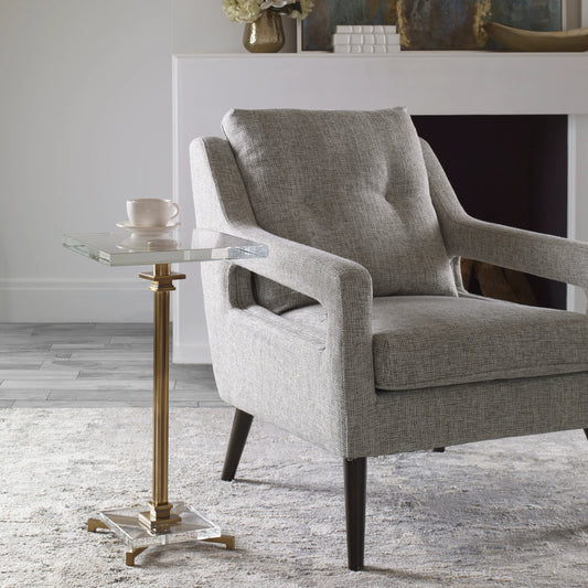 Richelieu Drink Table by Uttermost in brass. Made from metal, crystal in a transitional style.
