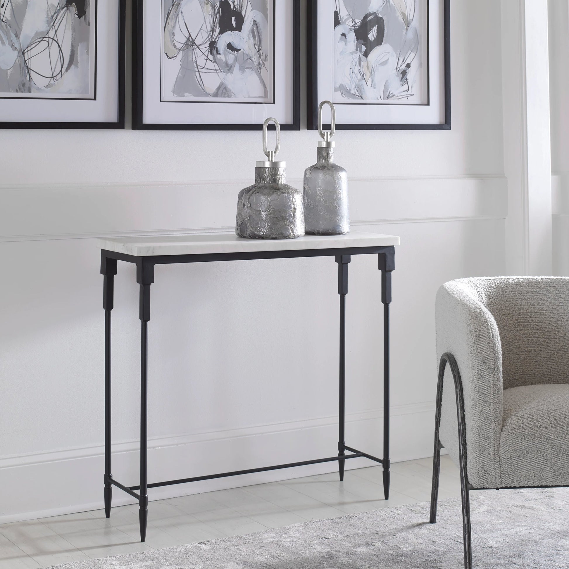Bourges Console Table by Uttermost in white, satin black. Made from marble, iron in a transitional style.