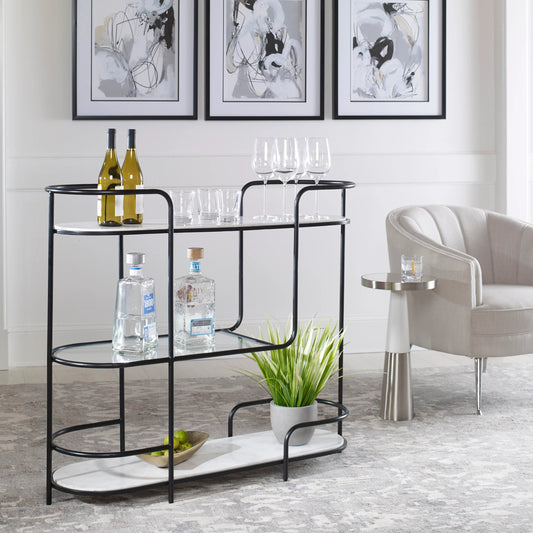 Trolley Bar Console by Uttermost in satin black. Made from marble, iron, tempered glass in a modern style.