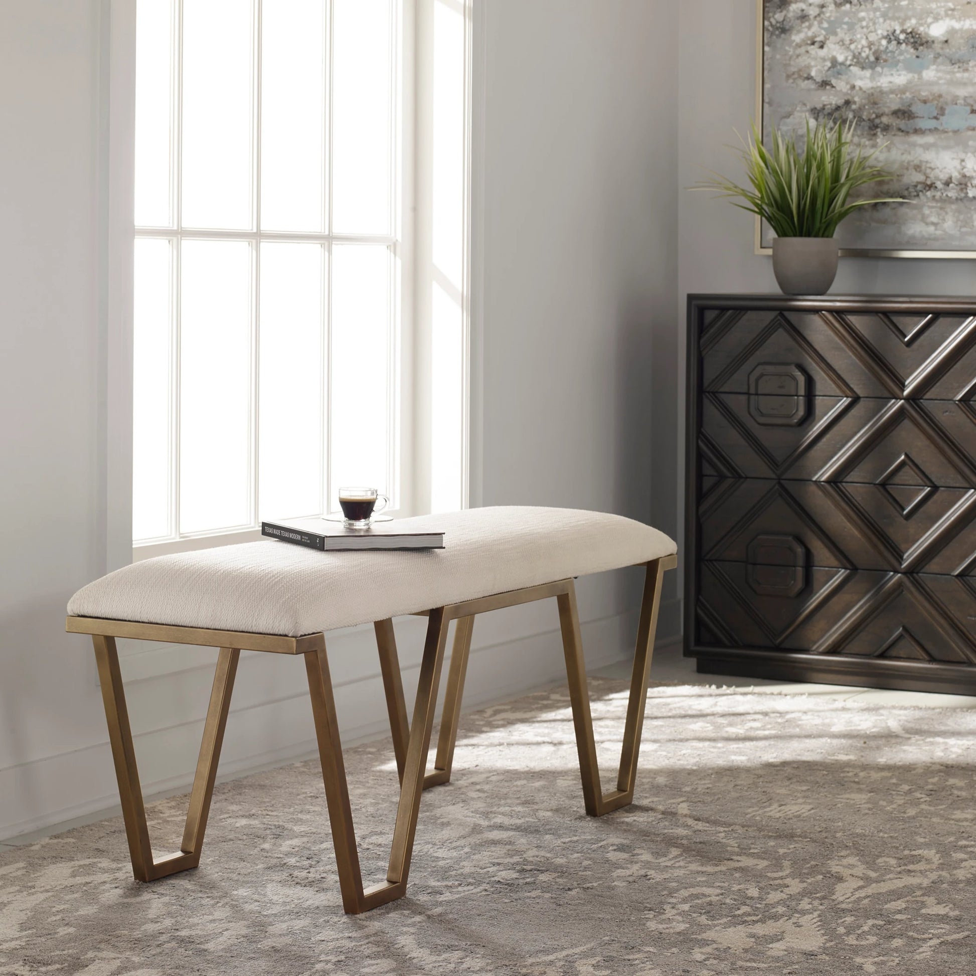 Farrah Bench by Uttermost in antique gold leaf. Made from iron, mdf, polyester, foam in a modern style.