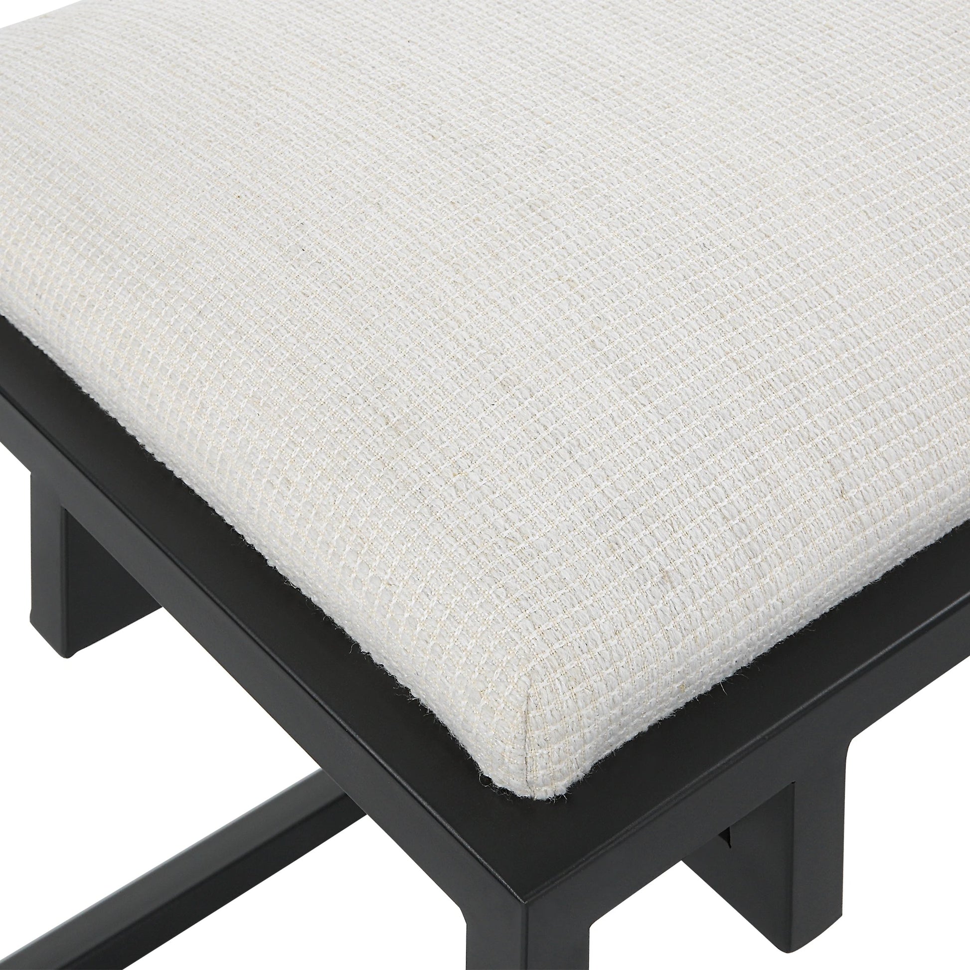 Paradox Bench by Uttermost in matte black. Made from iron, mdf, polyester, foam in a transitional style.