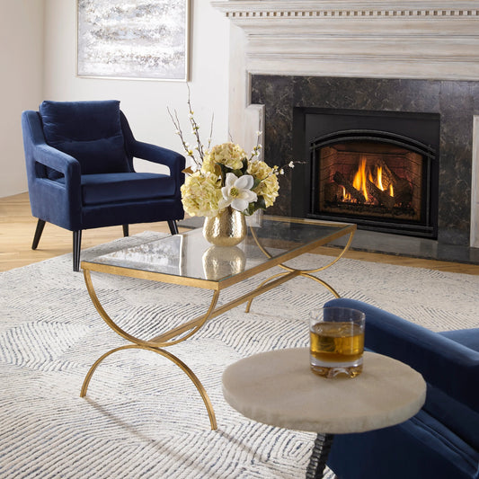 Crescent Coffee Table by Uttermost in gold. Made from iron, tempered glass in a modern style.