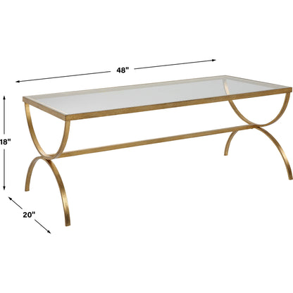 Crescent Coffee Table by Uttermost in gold. Made from iron, tempered glass in a modern style.
