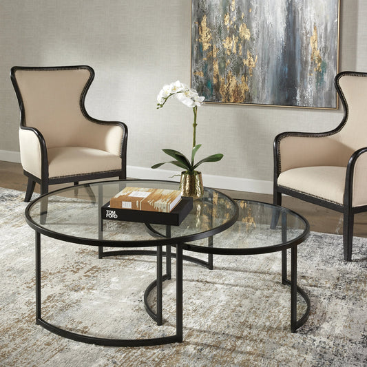 Rhea Nesting Coffee Tables by Uttermost in satin black. Made from iron, tempered glass in a modern style.
