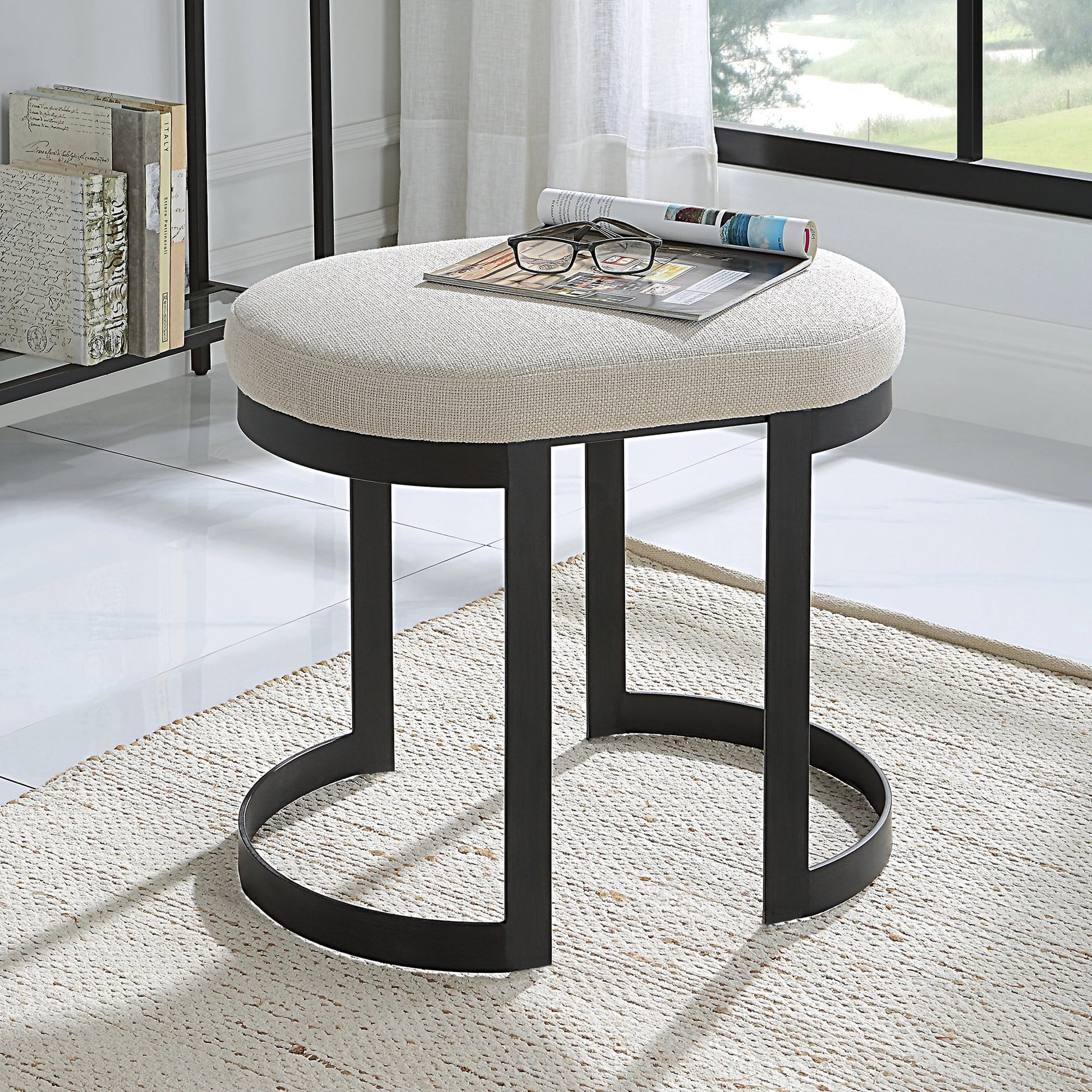 Infinity Accent Stool by Uttermost in gold. Made from metal, mdf, foam, fabric in a modern style.